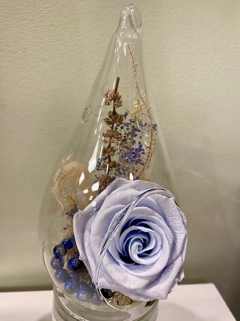 Preserved rose in an egg vessel. "Misty Blue."