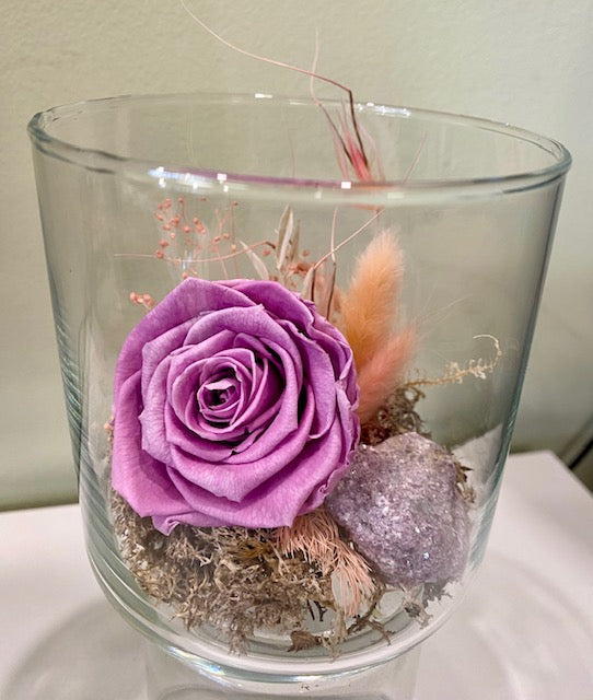 Pink preserved rose in a cylinder vessel. "Pink Paradise."