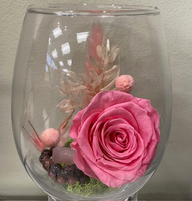Preserved rose in an egg vessel. "Hello, Barbie."